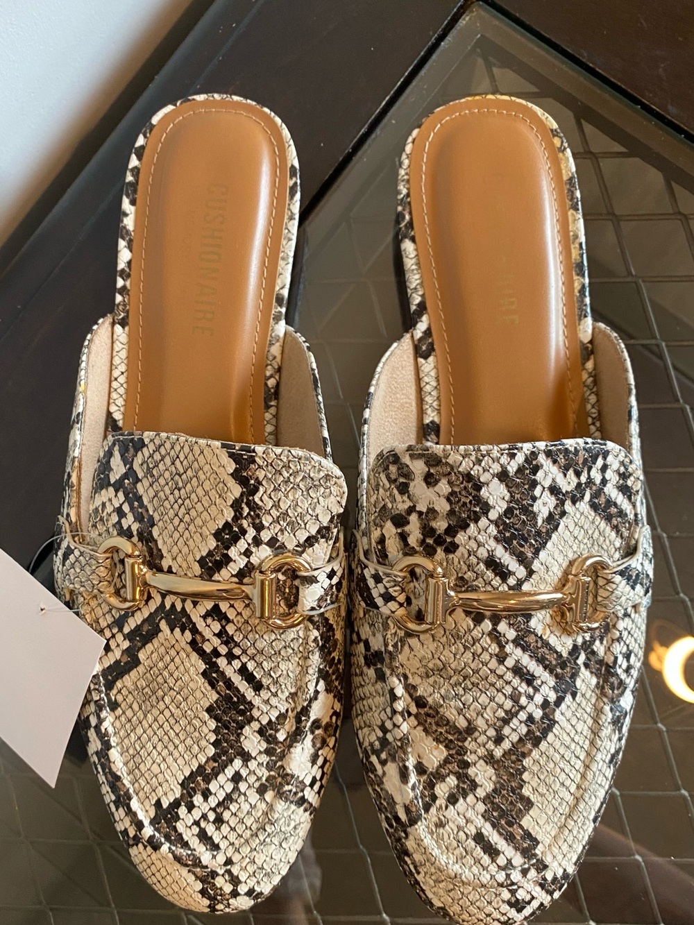 Cushionaire Gold-Bit Snake-Print Slip-On Mules in Black & Tan